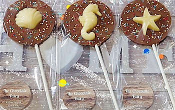 Milk chocolate 'seaside' lollipops